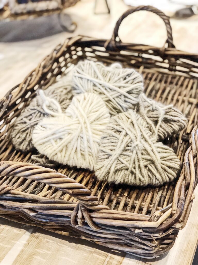 basket of yarn wrapped hearts