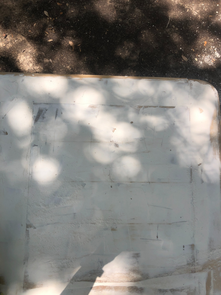 top view of coffee table covered with joint compound