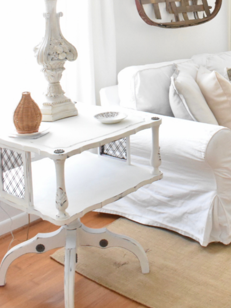 white square side table with lamp coaster diffuser beside couch